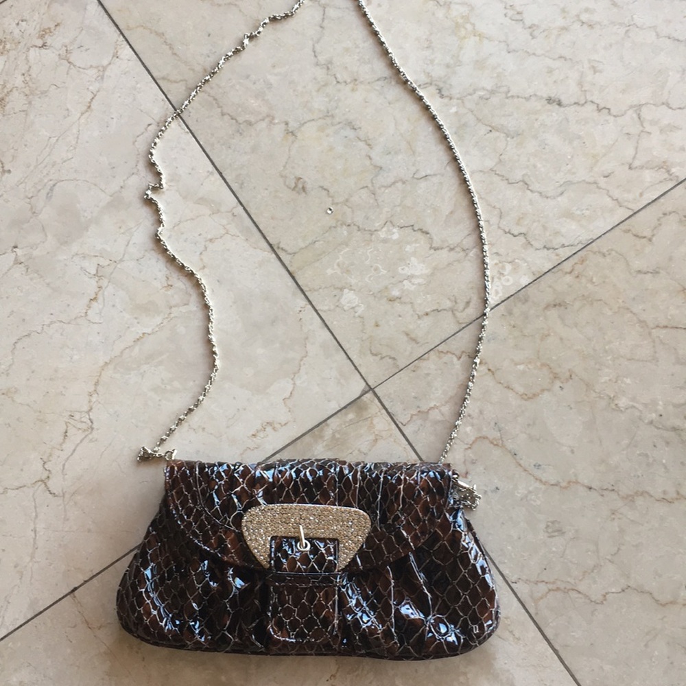 Brown clutch bag with strap